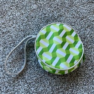 Clinique | green round wristlet